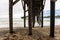 The poles under the pier of San Simeon, California, USA