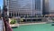 Police boat cruises under the LaSalle Street bridge on the Chicago River