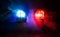 Police car blue and red round vintage siren in dark. Rotating retro style police siren in dark