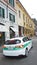 Police car - polizia locale in Milano - green and white vehicle