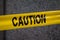 Police caution sign tape in city