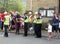 Police community support officers talk to people at the annual easter monday charity duck race in hebden bridge