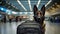 Police dog German shepherd with a suitcase at the airport. Generative AI.