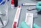 Police expert extracts traces of blood in a swab for analysis in the laboratory scientist