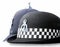 Police force headgear - female officer`s hat in front men`s helmet