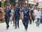 Police force walking in the road in Bangladesh