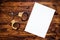 Police handcuffs and blank paper on investigator detective\'s wor