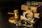 Police handcuffs and books of laws on black background. Wooden gavel and books on wooden table, law concept. Law and order