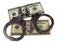 Police handcuffs false and real hundred-dollar bill.