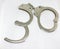 Police handcuffs and white background