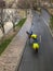 Police on horses patrol partially flooded Parc des Rives de Seine, Paris, France