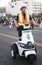 Police officer on 3 wheel motorized vehicle
