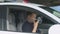 Police officer in car using walkie-talkie, dispatcher informing about emergency