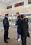 The police officer controls the public order at the railway station of Tula station.