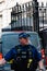 Police officer guarding 10 Downing Street in London
