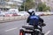 Police officer riding a BMW motorcycle in the Bucharest city traffic