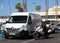 Police officer talks to a man driving a van in Tenerife, Spain