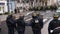 Police officers in front of French yellow vests overhead view