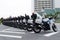 Police officers motorcycle line up on the road