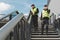 Police officers in reflective vests patrol the streets of the city