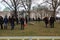 Police officers resist people during a protest against green certificate