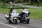 Police officers riding motorbikes