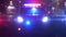 Police patrol car at scene of emergency optical lens defocus