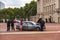 Police search a car in the grounds of Buckingham Palace