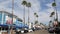 Police sheriff car. Palm trees on street, pacific coast tropical resort. Oceanside, California USA