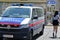 Police vehicle at a large demonstration in Vienna