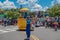 Police woman jumping in Sesame Street Party Parade at Seaworld.