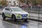 Police worker riding car on military parade