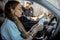 Policeman checking documents of a female driver