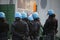 Policeman with riot gear and helmets during the uprising town