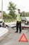 Policeman at road accident scene