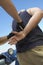 Policeman\'s Hands Arresting Criminal