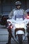 Policeman Wearing Helmet While Sitting On Motorbike