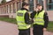 Policemen speaking on the walkie-talkie during intervention