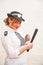 Policewoman in uniform with truncheon