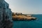 Polignano a mare coast in Bari, Italy during summer with turquoise blue water in the sea