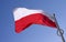 Polish flag flying on the wind