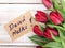 Polish Mother`s Day card and a bouquet of beautiful tulips