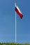 Polish national flag at the summit of liberation mound