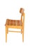 Polish original wooden chair from the 70s and 80s, side view.