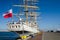 Polish sail training ship Dar Mlodziezy the Gift of Youth in Gdynia port over Baltic Sea