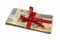 Polish zloty banknotes tied with red ribbon isolated on white