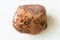 Polished Bauxite rock on white marble