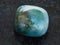 polished Bloodstone (Heliotrope) gemstone on dark