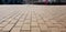 Polished brick pavement tile color. Depth of low field