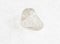 polished clear quartz ( rock-crystal) gem on white